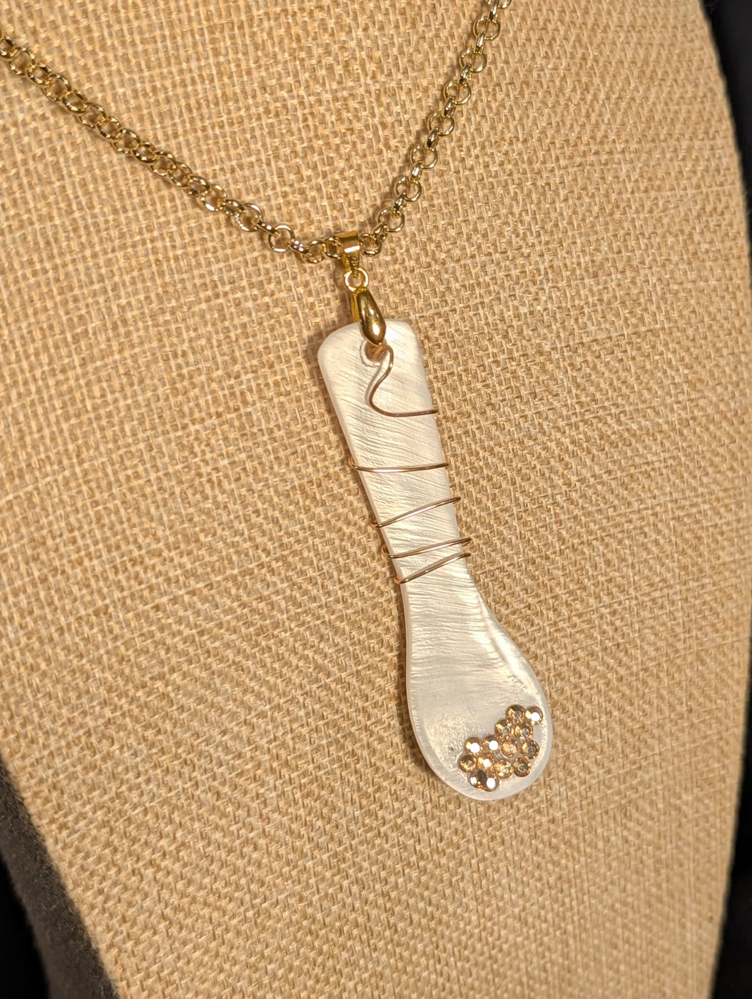 Close detail of Caviar Spoon Necklace No. 8